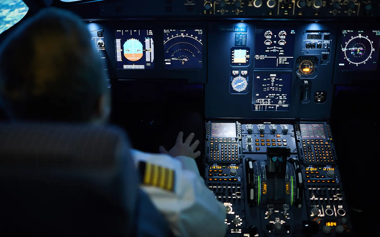 Pilot in cockpit during training